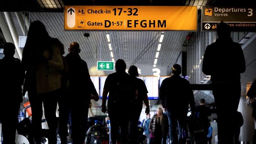 Problemen op Schiphol door nasleep storing en slecht weer